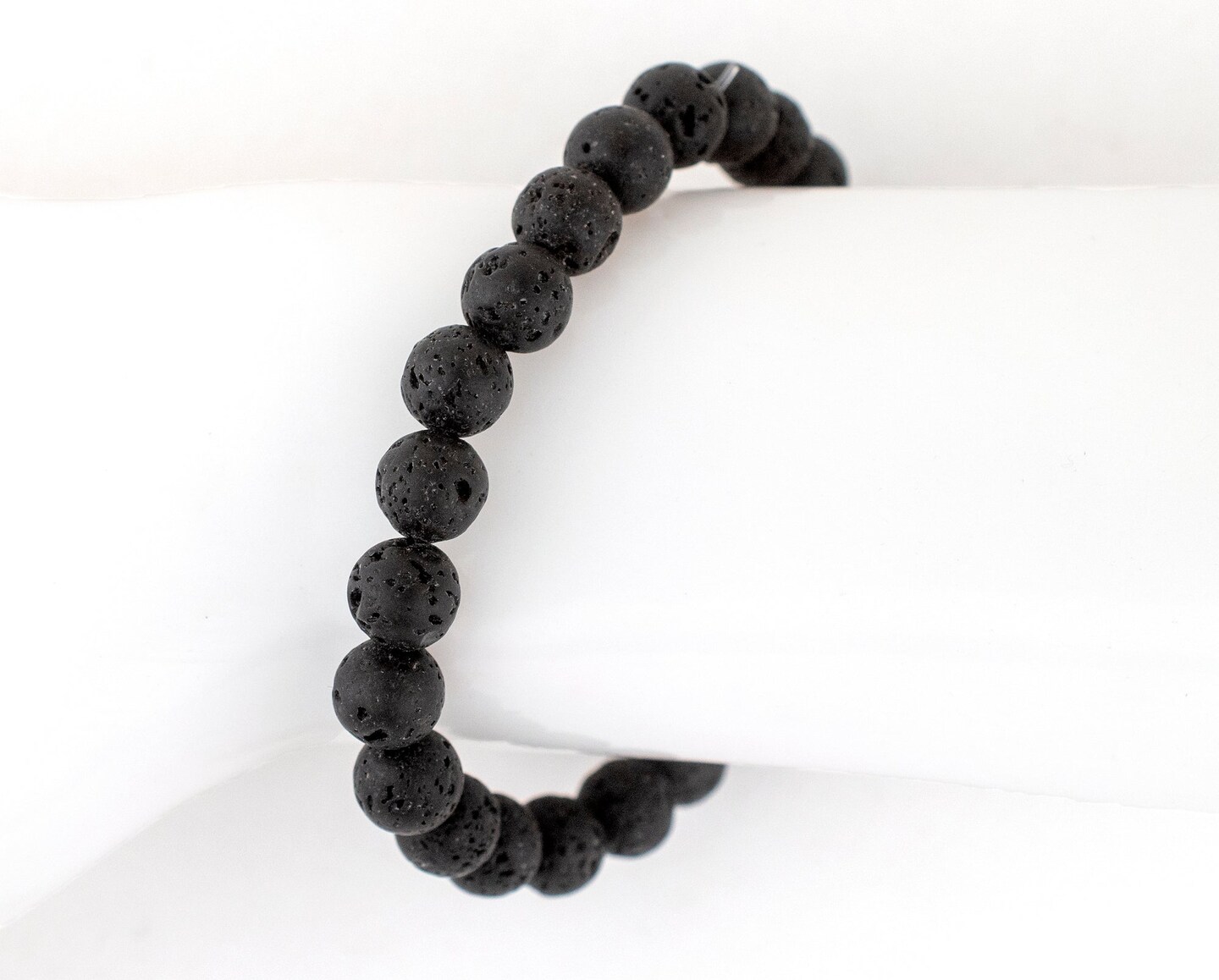 The Bead Chest Natural Lava Stretch Bracelet Black Round Stone