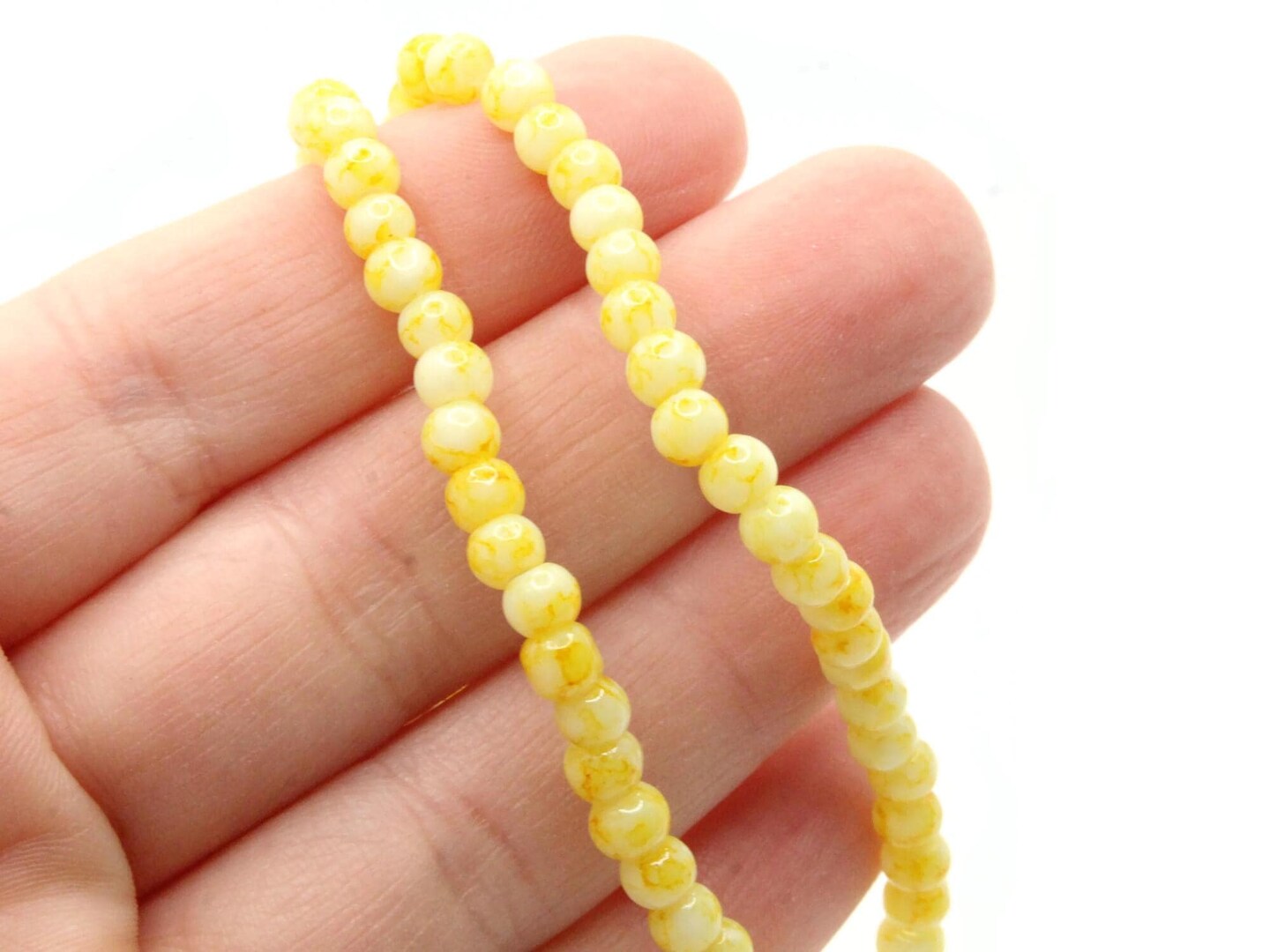 100 4mm White with Yellow Splatter Paint Smooth Round Glass Beads