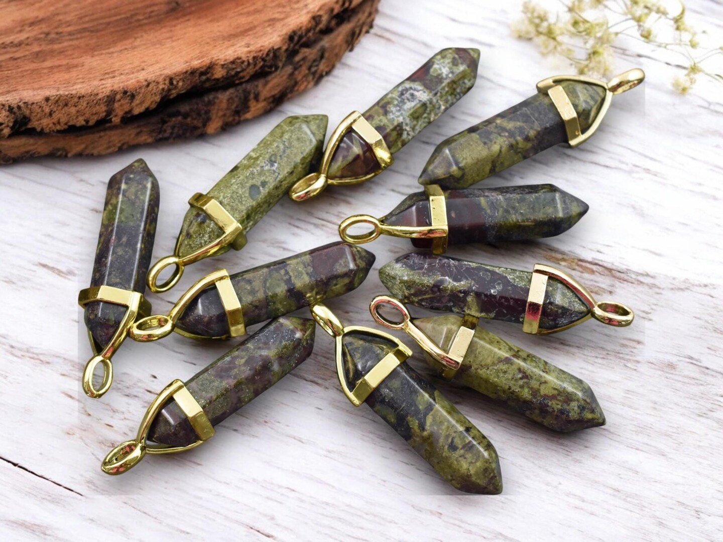 40mm Gold Tone Natural Dragon Blood Double Terminated Bullet Pendant
