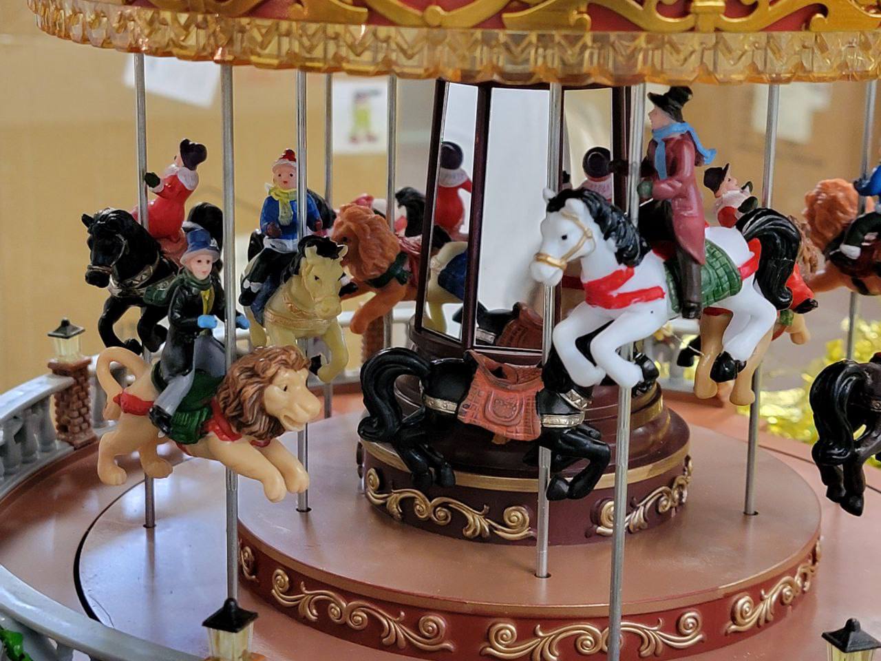 Christmas Carousel Decoration. Animated Christmas Village