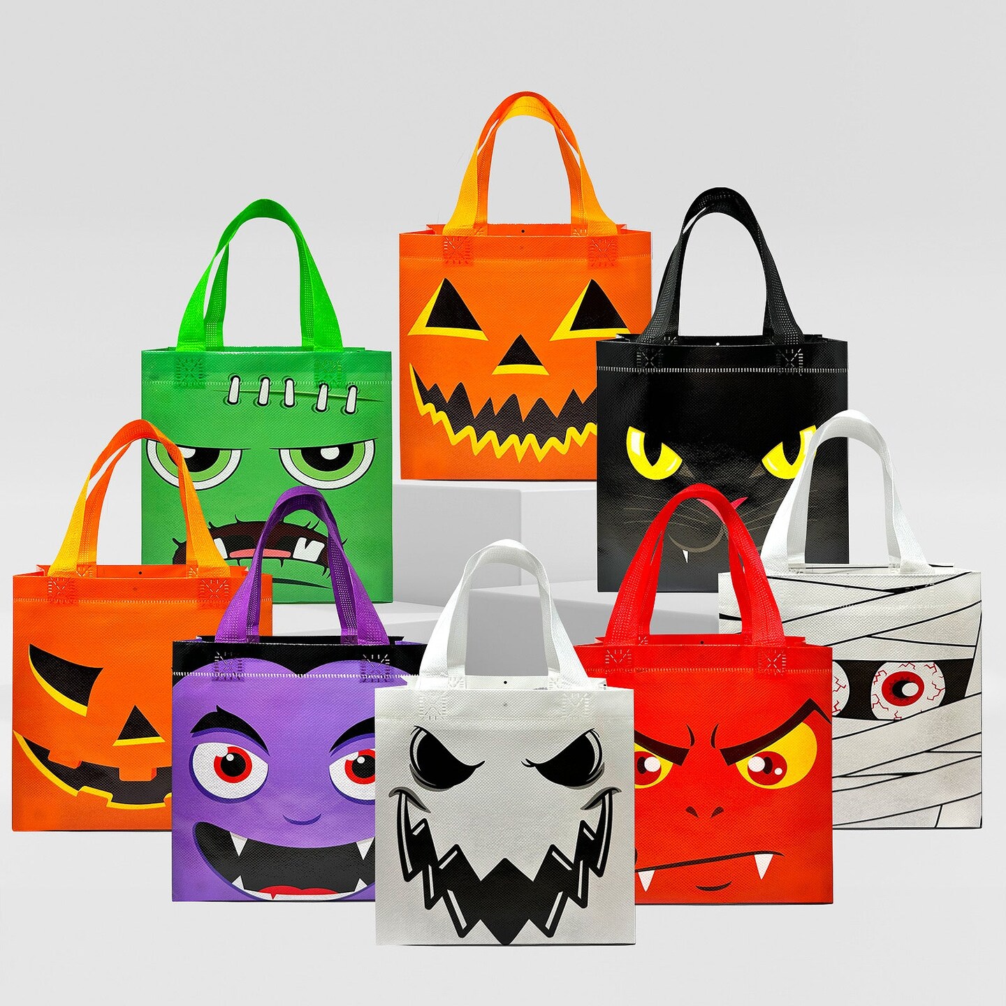 Wrapables Non-Woven Reusable Halloween Trick or Treat Bags with Handles for Parties, Gifts, Candy and Treats (Set of 8), Monster