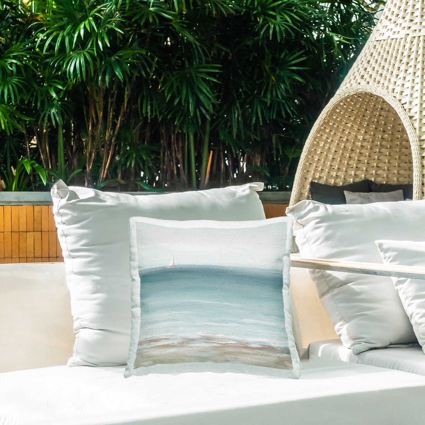 Faraway Boat on Ocean Outdoor Printed Pillow Design by Nan, 18 x 7 x 18