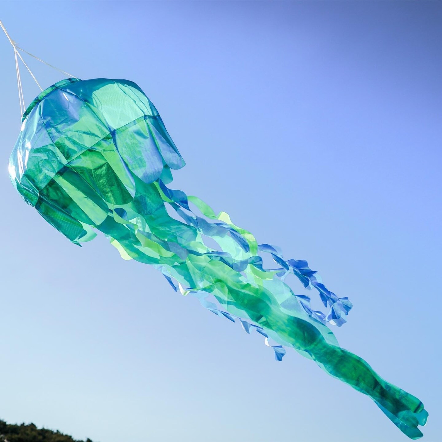 In the Breeze 5257 — 40-inch Teal Iridescent Jellyfish 3D Windsock — Simmering Windsock with Inflatable Head and Free-Flowing Tentacles