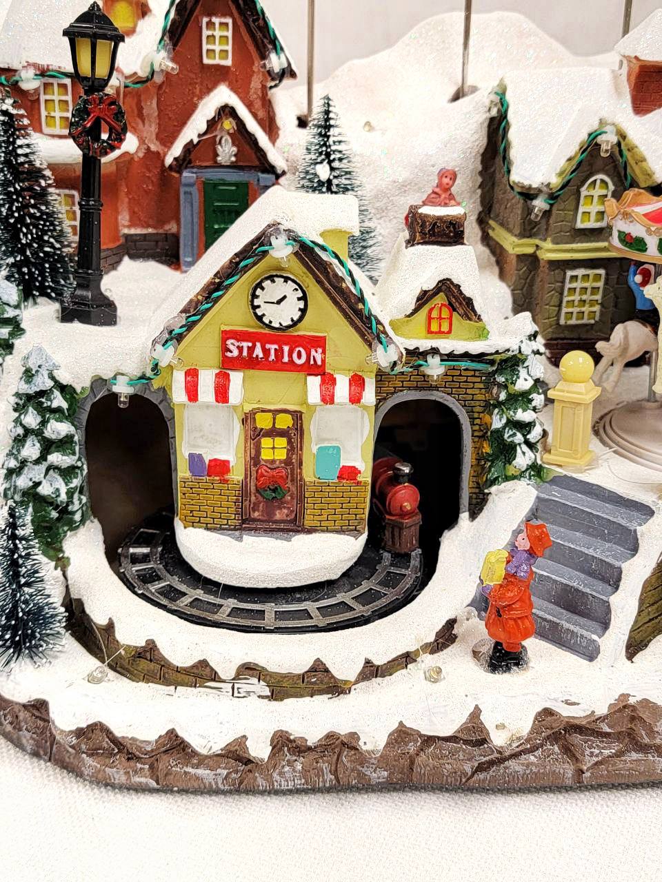 Snow-covered Village Christmas Decoration. Christmas Village