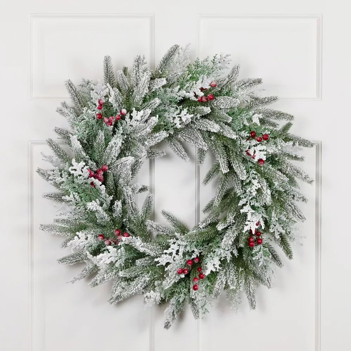 Flocked Wind River Fir Artificial Christmas Wreath with Red Berry Accents 24 Inch