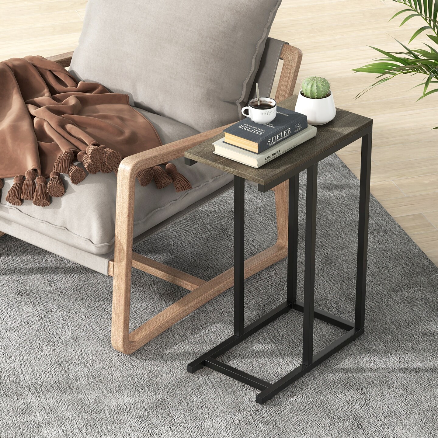 Black Metal C-Shaped Side Table with Sturdy Frame and Space-Saving Design