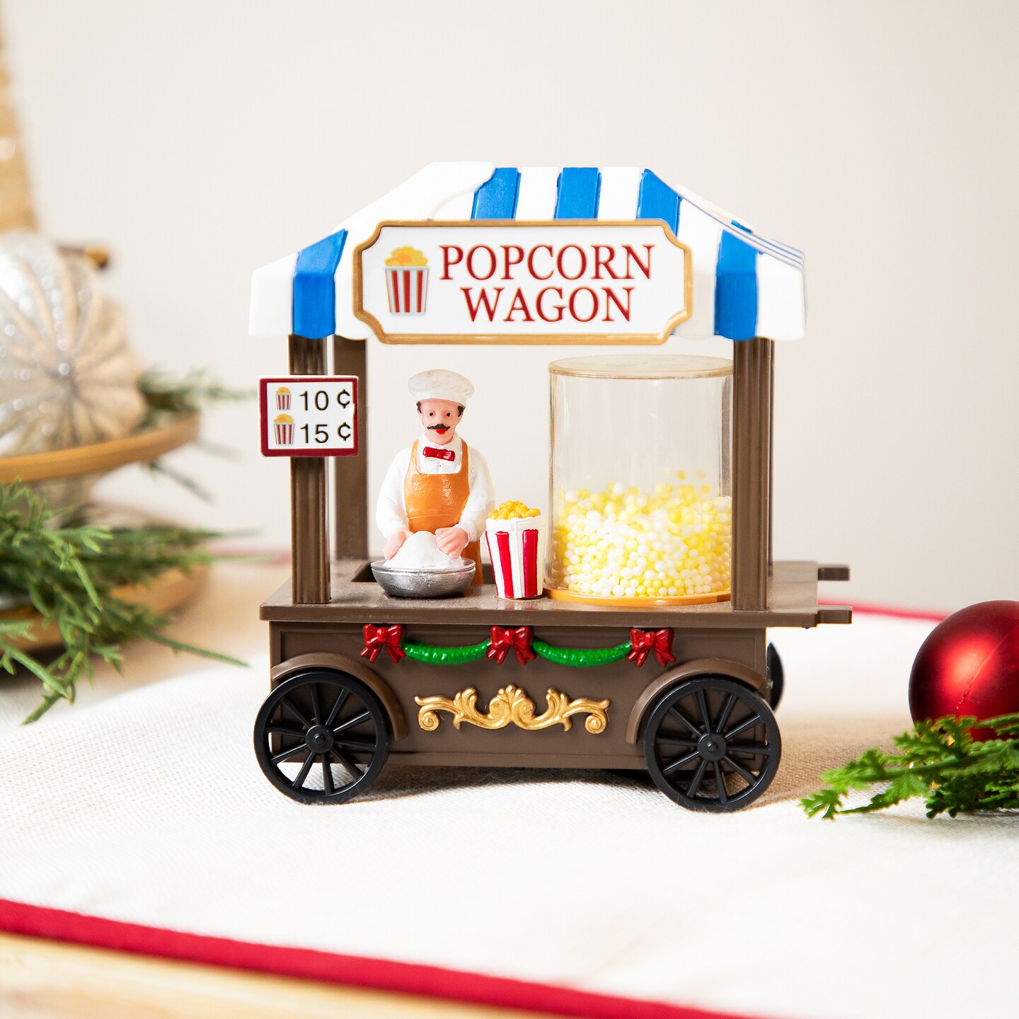 Northlight LED Lighted and Animated Popcorn Wagon Christmas Village Piece - 5"