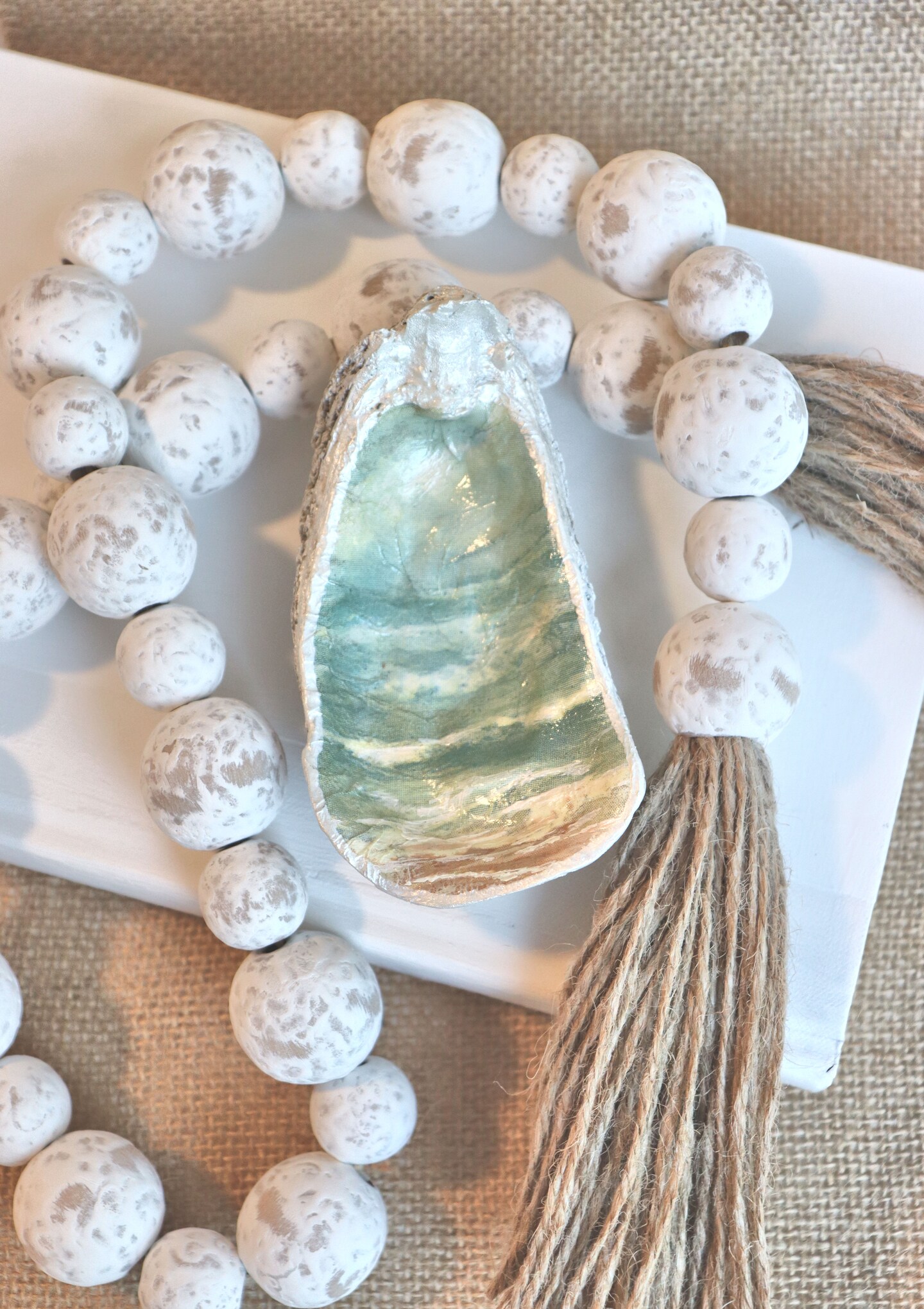 Oyster Shell Garland - Coastal | MakerPlace by Michaels