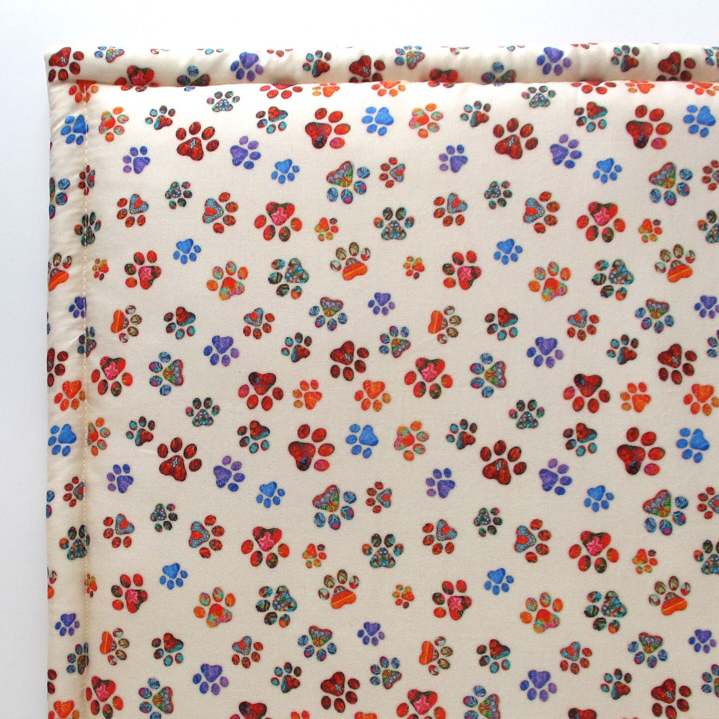 product name is Catnip Filled Cat Mat, 16.5 by 16.5 inch Paw Print Cat Bed