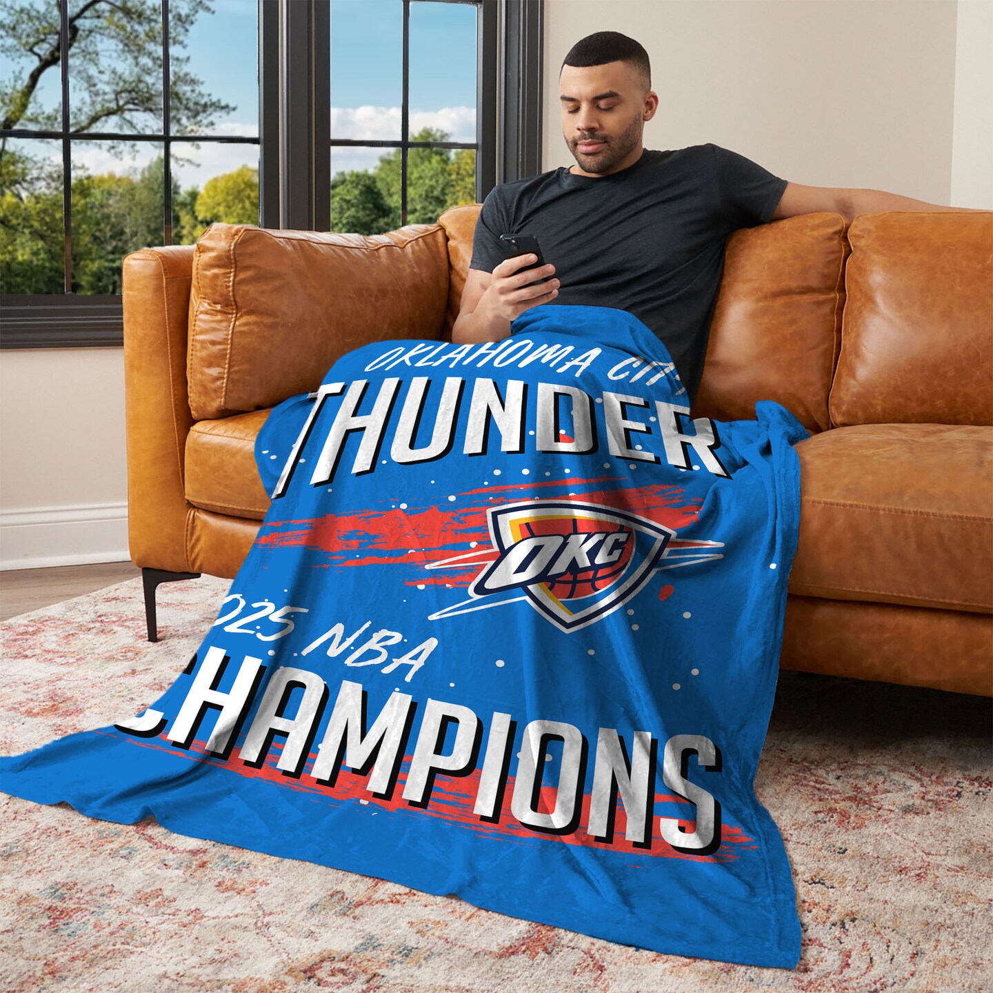 NBA Oklahoma City Thunder 2025 Champs Net Gain Silk Touch Throw Blanket