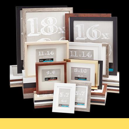 black, brown and white frames in assorted sizes on black background