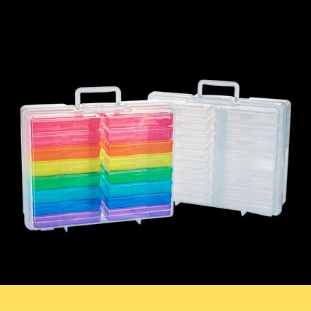plastic photo storage box in rainbow color and clear on black background
