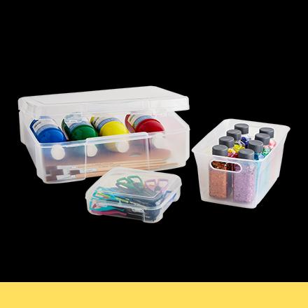 clear plastic craft storage filled with art supplies