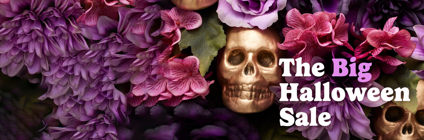 gold skulls in purple and pink faux flowers with The Big Halloween Sale logo