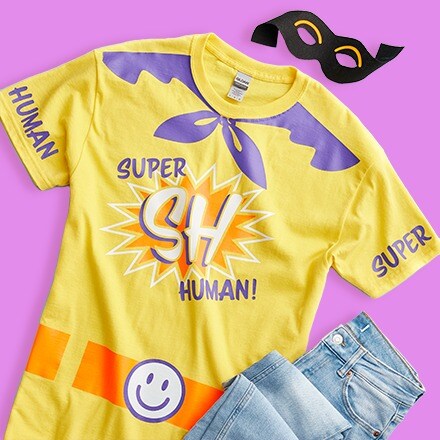 yellow t-shirt with Super Human design on purple background