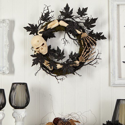 Black decorative Wreath with a skeleton and black leaves