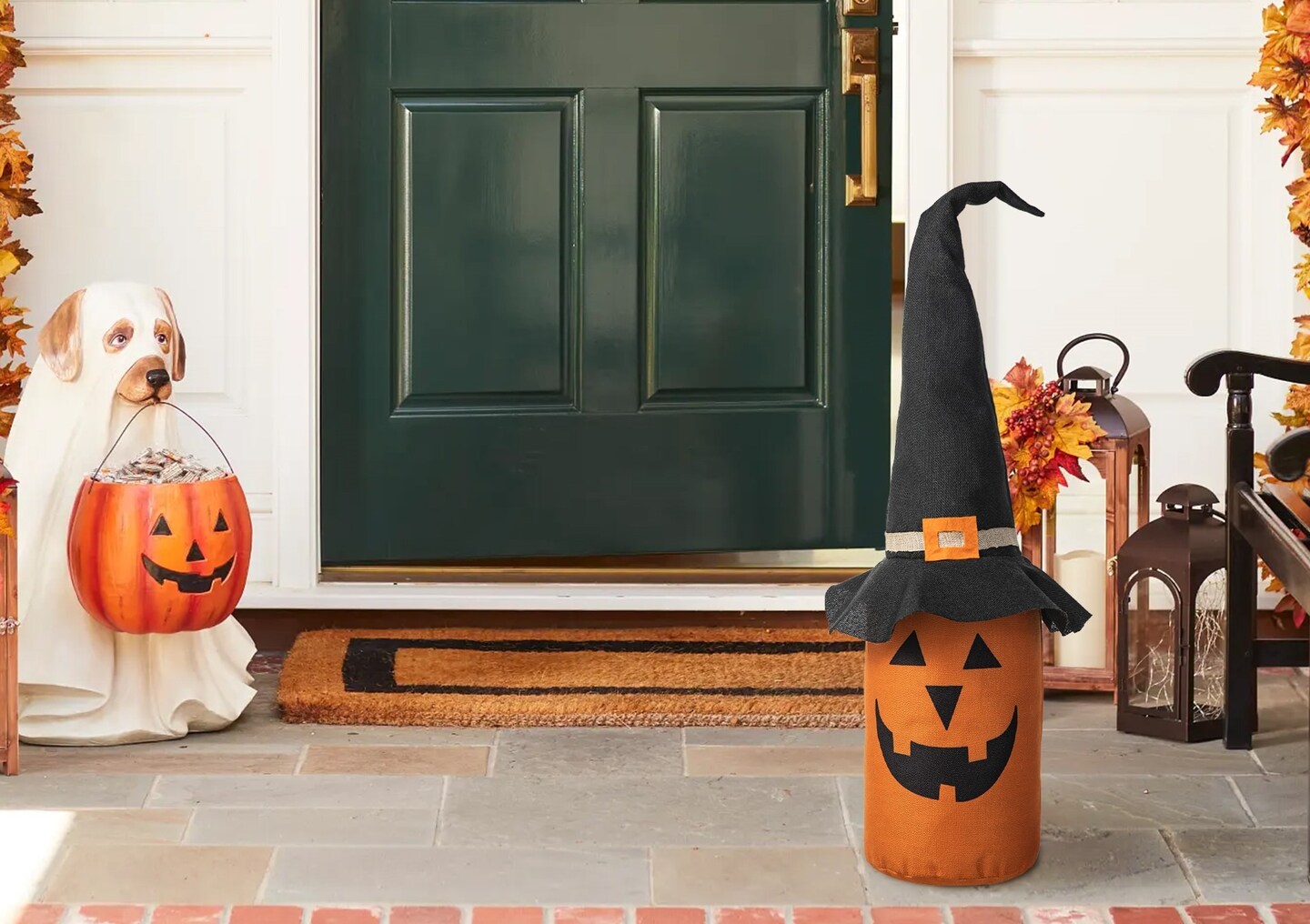 Porch with pumpkin decorations and a decorative dog with a ghost costume