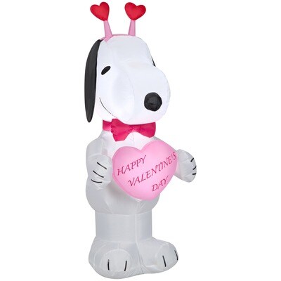 Snoopy inflatable with a heart that says Happy Valentine's Day