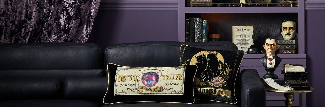 Midnight Moon Collection: Black and Purple colored decorations: Pillows, wall decor, tabletop.