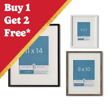 three wood frames with cream matts and red triangle with Buy 1, get 2 Freee in white text 