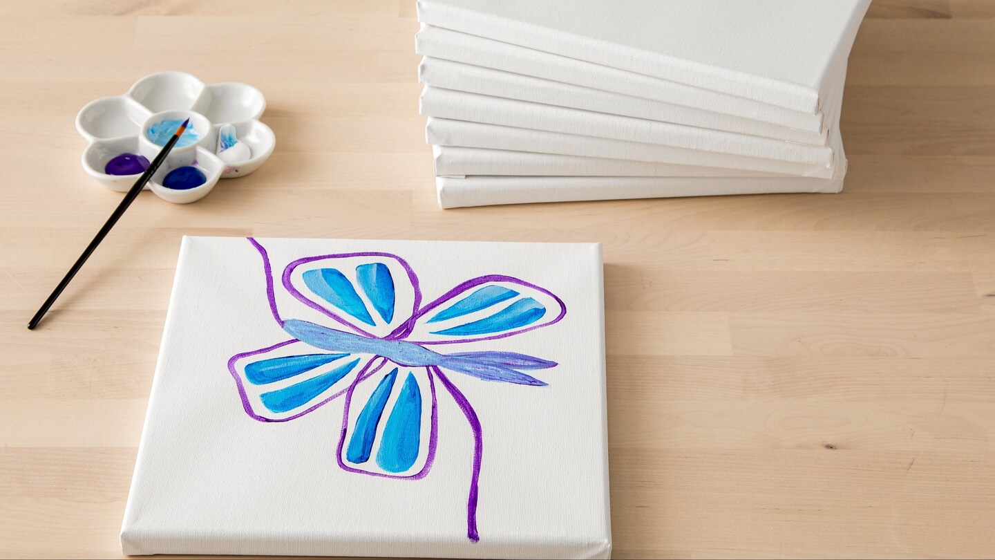 canvas with blue flower painting