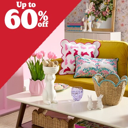living room with easter decorations and up to 60% off in white text over red triangle