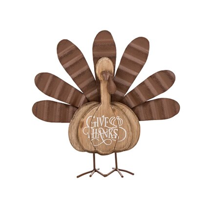 brown turkey decoration with give thanks messaging