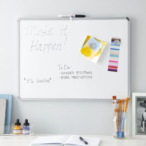 Whiteboard with "Make it Happen!" in black dry erase marker. 