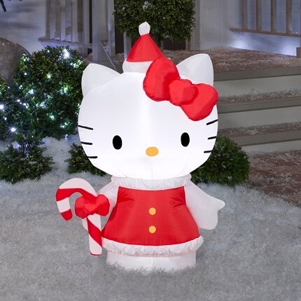 Christmas Inflatables: Hello Kitty Inflatable with a candy cane