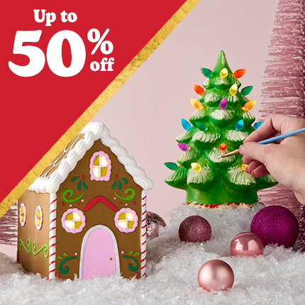 painted ceramic Christmas tree and gingerbread house with 50% off in white text over red triangle