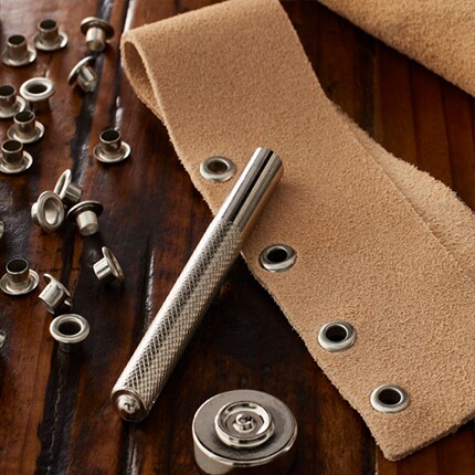 leather strip with grommets and tools