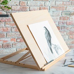 tabletop easel with drawn bird displayed