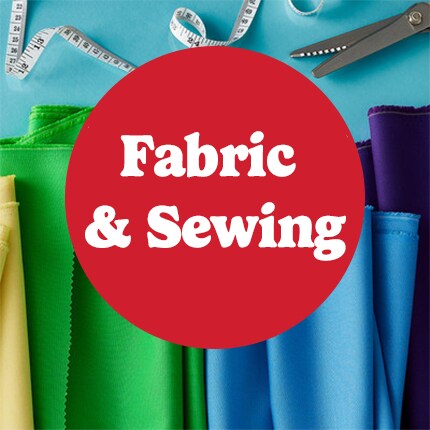 fabric and sewing in white text in red bubble over cuts of fabric in rainbow colors
