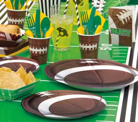 foorball themed party plates and cups on table