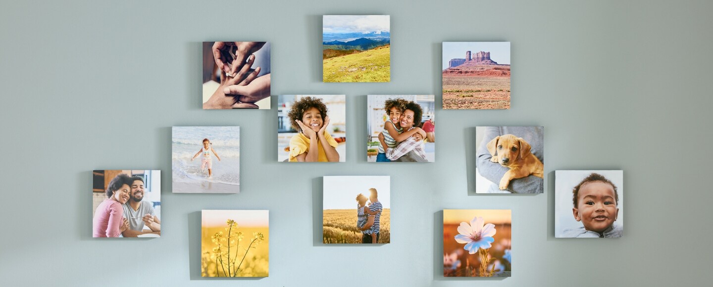 A collection of frames hung up on a wall.