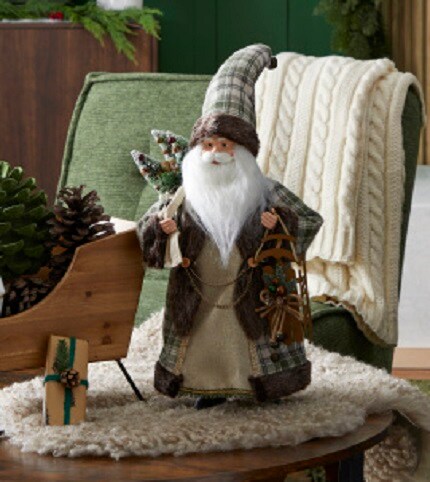 Santa figurine with brown and green clothing