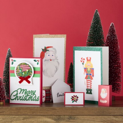 Christmas Cards on wood table and red background
