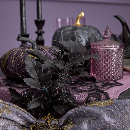 Skulls with masquerade masks on and top hats