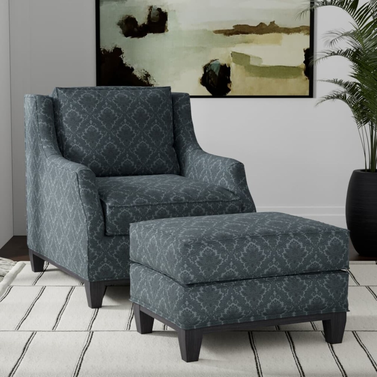 chair and ottoman in navy damask fabric