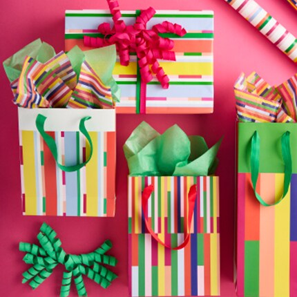 Party gift bags in pastel colors and floral designs