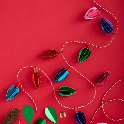 Red and white twine and paper light bulbs