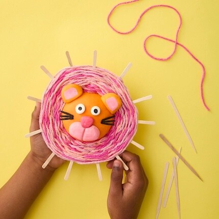 Image of the woven clay lion project