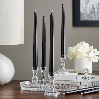 4 black tapers in glass holders