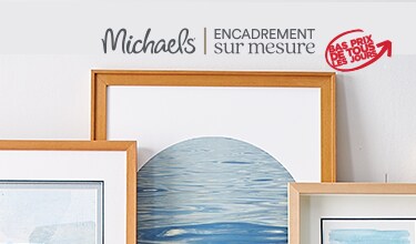 A bundle of frames placed against a wall.