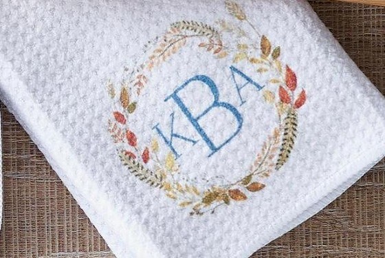 Decorative white towel with fall leaf print