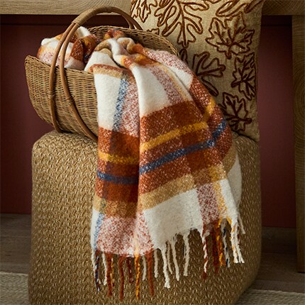 Fall inspired striped throw in orange, yellow, cream and blue colors