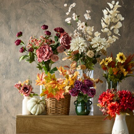 Fall florals in vases on a table