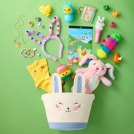 bunny basket spilling out kids toys and crafts