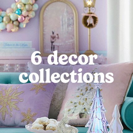 Festive pastel living room with decorative pillows, a sparkling glass tree, and a colorful wreath. Text reads, "6 decor collections." Cozy and inviting.