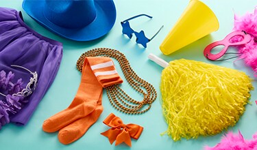 pink boa, blue cowboy hat, orange socks and yellow pom-pom